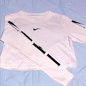 White Nike long sleeve crop top.